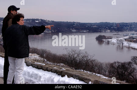 Feb 26, 2003 - Cincinnati, Ohio, USA - The rising waters of the Ohio River continue to swell to a flood stage of 52 feet, 26 feet over normal levels. Rising to a 6 year high, the water has covered the parking lots of restaurants, riverfront homes, flooded boat harbors, covered some low laying roads, Stock Photo