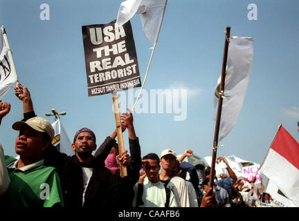 JAKARTA, INDONESIA - MARCH 20, 2003  Hundreds of demonstrators ranging from political parties and students gather in front of the US Embassy to protest against US military action in Iraq.  The demonstration goes on peacefully without any incidents.  Photo by Roy Rubianto/JiwaFoto Stock Photo