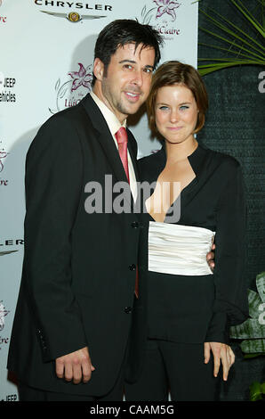 Oct 18, 2003; Beverly Hills, California, USA; Actress ASHLEY WILLIAMS & Actor JONATHAN SILVERMAN at the Lili Claire 6th Annual Benefit held at Beverly Hilton Hotel. Stock Photo