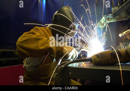 1:15 PM Candy Smith of Vallejo practices her MIG (metal inert gas) welding at the Northern California Laborers Training Center in San Ramon, Calif. Wednesday, January 14, 2004. Smith has wanted to learn to weld ever since she saw Flashdance years ago. The center offers classes free of charge to memb Stock Photo