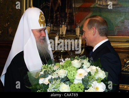 The president of the Russian Federation Vladimir Putin congratulates the patriarch Moscow and Vseja Russia Alex II on 75-years anniversary. (Credit Image: © PhotoXpress/ZUMA Press) RESTRICTIONS: North and South America Rights ONLY! Stock Photo