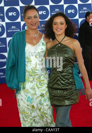 Feb 28, 2004; Santa Monica, California, USA; Actress KEISHA CASTLE-HUGHES & MOTHER at the 2004 IFP Independent Spirit Awards held in a tent on Santa Monica Beach. Stock Photo