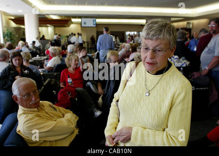 Mar 18, 2004; West Palm Beach, FL, USA; Palm Beach International Airport, JERRY, left sitting, and GLADYS BOBER (cq), of Boynton Beach wait at the Spirit Airline terminal gate to board their flight to Atlantic City, New Jersey after it was delayed around four hours because of a bomb threat at the Pa Stock Photo