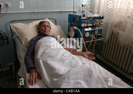 Mar 22, 2004; Kosovo, SERBIA; An elderly Serbian women at the hospital in Kosovska Mitrovica. She was injured during the latest ethnic cleansing by Albanians. The worst ethnic violence since the 1998-1999 Kosovo war erupted here and spread to other parts of the troubled province in southern Serbia.  Stock Photo