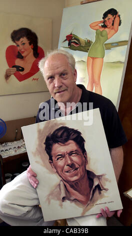 (Published 06/18/2003, NC-1; NI-1; B-4:2; 06/19/2003, B-7:6): Portrait of artist BARON JERRY VON LIND in his Oceanside beach area apartment with a portrait of Ronald Reagan he did while Reagan was president and a couple  of his ''pin-up'' style paintings behind him.  U/T photo CHARLIE NEUMAN Stock Photo