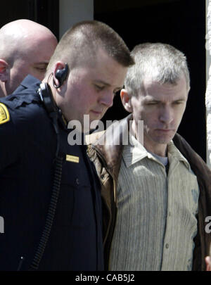 Apr 29, 2004; Somerville, NJ, USA; CHARLES CULLEN is escorted into the Somerset County Courthouse in Somerville. Investigators are poring over patient records in two states after Cullen claimed he killed 30 to 40 terminally ill patients to alleviate their suffering and was charged with murder. Culle Stock Photo