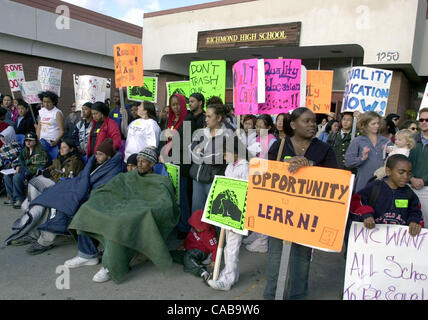 Students and members of Californians For Justice hold a rally outside Richmond High School charging the state for school inequality on the 50th anniversary of Brown vs. Board of Education in Richmond, Calif., on Monday, May 17, 2004. (Contra Costa Times/Eddie Ledesma) Stock Photo