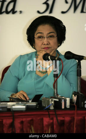 JAKARTA, INDONESIA - MAY 31, 2004  Megawati 31 May defended goverment moves against critical foreign human rights activists. Megawati and Muzadi, speaking to journalist at rare press conference on their campaign plans, were referring to Jakarta's intention not to renew a visa for Sidney Jones, the J Stock Photo