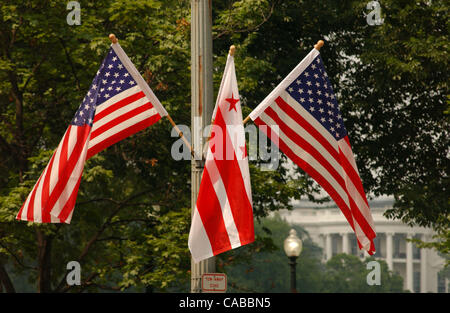 Flags line Constitution Ave. in preparation for former President Ronald Reagan's funeral procession on June 8, 2004. Reagan, who was the 40th president, died at the age of 93. Stock Photo