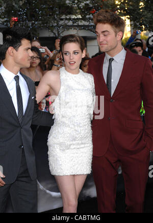 June 24, 2010 - Hollywood, California, U.S. - Taylor Lautner, Kristen Stewart and Robert Pattinson during the Los Angeles Film Festival premiere of the new movie from Summit Entertainment, The  TWILIGHT SAGA: ECLIPSE, held at the Nokia Theater at L.A. Live, on June 24, 2010, in Los Angeles, Californ Stock Photo