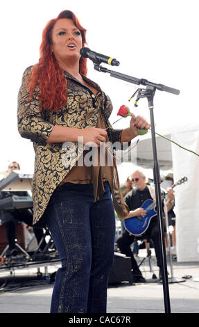 Jun 10, 2010 - Nashville, Tennessee; USA - Singer / Guitarist WYNONNA JUDD of the group The Judds kick off the CMA Music Festival at the Riverfront Stages located in downtown Nashville. Copyright 2010 Jason Moore. (Credit Image: © Jason Moore/ZUMApress.com) Stock Photo