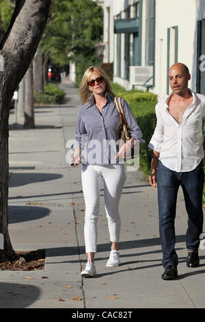 Jun. 08, 2010 - Los Angeles, California, U.S. - Melanie Griffith exits Neil George salon after having her hair styled. (Credit Image: © Laguna Images/ZUMApress.com) Stock Photo