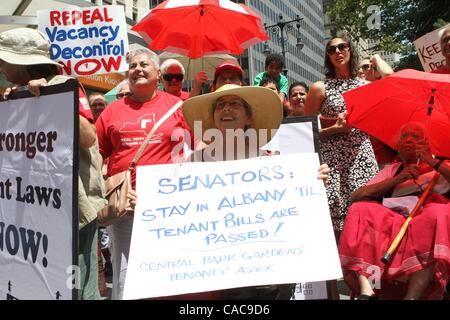 Jul 11, 2010 - New York, New York, U.S. - Tenants are arrested in protest of Sate Senate inaction on restoration of rent law protections at 250 Broadway in Manhattan. (Credit Image: Â© Mariela Lombard/ZUMApress.com) Stock Photo