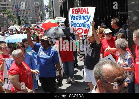 Jul 11, 2010 - New York, New York, U.S. - Tenants are arrested in protest of Sate Senate inaction on restoration of rent law protections at 250 Broadway in Manhattan. (Credit Image: Â© Mariela Lombard/ZUMApress.com) Stock Photo