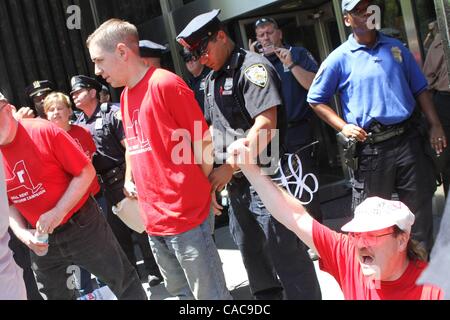 Jul 11, 2010 - New York, New York, U.S. - Tenants are arrested in protest of Sate Senate inaction on restoration of rent law protections at 250 Broadway in Manhattan. (Credit Image: Â© Mariela Lombard/ZUMApress.com) Stock Photo