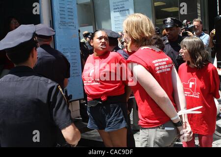 Jul 11, 2010 - New York, New York, U.S. - Tenants are arrested in protest of Sate Senate inaction on restoration of rent law protections at 250 Broadway in Manhattan. (Credit Image: Â© Mariela Lombard/ZUMApress.com) Stock Photo