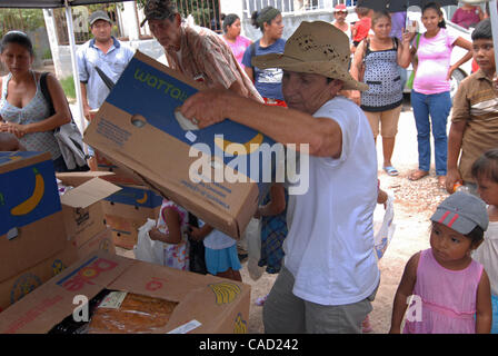 Aug 12, 2010 - Reynosa, Mexico - DIANNE HURMAN stacks and organizes boxes of food at the Frank Ferree Distribution center. (Credit Image: © Josh Bachman/ZUMApress.com) Stock Photo