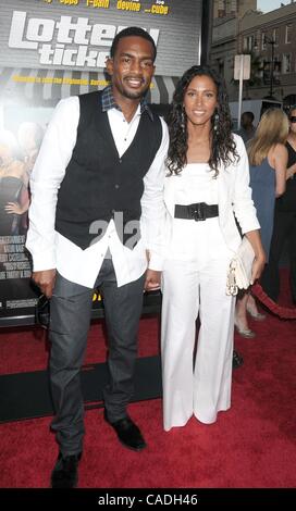 Aug. 12, 2010 - Los Angeles, California, USA - Aug 12, 2010 - Los Angeles, California, USA - Actor BILL BELLAMY and wife KRISTEN BAKER  at the  'Lottery Ticket' World Premiere held at Grauman's Chinese Theater, Hollywood. (Credit Image: © Paul Fenton/ZUMApress.com) Stock Photo