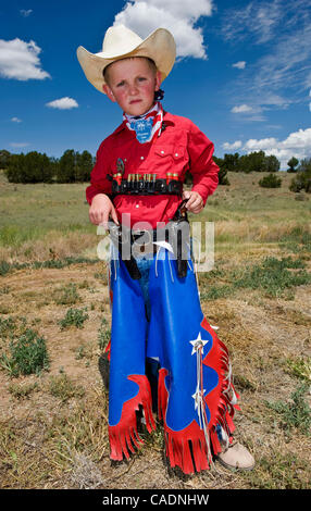 June 25, 2010 - Edgewood, New Mexico, USA -  REED HARRISON, 8, alias 'Winchester Reed,' poses during End of Trail, the Single Action Shooting Society's annual week-long World Championship of Cowboy Action Shooting and Wild West Jubilee.  Dedicated to preserving the history and traditions of the Old  Stock Photo