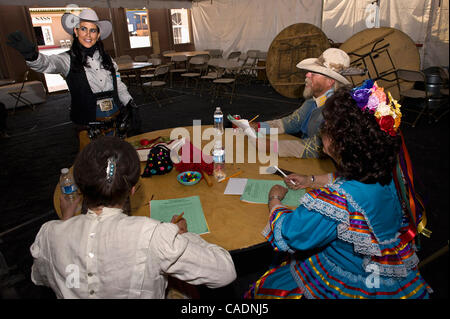 June 25, 2010 - Edgewood, New Mexico, USA -  DEBORAH MONTGOMERY, alias 'Perfecto Vaquera,' talks to the costume competition judges about her clothing at End of Trail, the Single Action Shooting Society's annual week-long World Championship of Cowboy Action Shooting and Wild West Jubilee.  Dedicated  Stock Photo