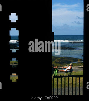 Jul 21, 2010 - Big Island, Hawaii, U.S. - Folks relax along the ocean at Keaukaha Beach Park in Hilo on the Big Island, Hawaii. (Credit Image: © L.E. Baskow/ZUMApress.com) Stock Photo