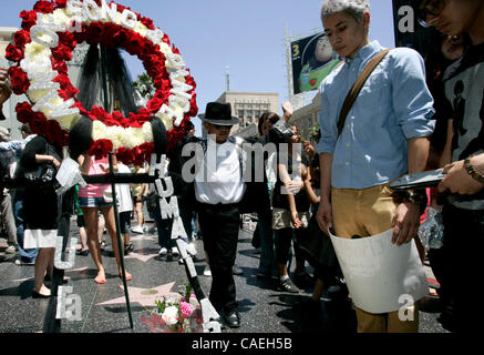 June 25, 2010 - Hollywood, California, USA - Fans gathered in tribute at Michael Jackson's star on the Hollywood Blvd  on the Hollywood Walk of Fame on the one year anniversary of the death of the King of Pop. (Credit Image: © Jonathan Alcorn/ZUMApress.com) Stock Photo