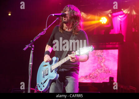 The Foo Fighters with Dave Grohl lead vocals performing at Madison Square Garden on February 19, 2008.  Dave Grohl - lead vox and guitar (beard, long black hair) Nate Mendel - bass,Taylor Hawkins - drums, Chris Shiflett - guitar Stock Photo