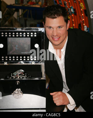 Singer NICK LACHEY unveils the one-of-a-kind 40th anniversary diamond-encrusted Hot Wheels car at the Mattel Showroom.  The car commemorates the production of the 4 billionth Hot Wheels vehicle. The diamonds on the custom-made jeweled car, valued at $140,000, total more than 2,700 and weigh nearly 2 Stock Photo