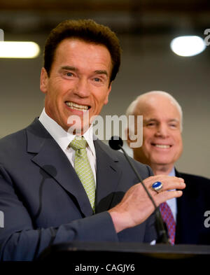Jan 31, 2008 - Los Angeles, California, USA - California Governor ARNOLD SCHWARZENEGGER and Presidential hopeful JOHN MCCAIN, tour Solar Integrated Technologies in Los Angeles before the Governor announce his endorsement of McCain at a news conference, Thursday Jan. 31, 2008. Also attending was Mayo Stock Photo
