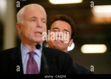 Jan 31, 2008 - Los Angeles, California, USA - Presidential hopeful JOHN MCCAIN thanks California Governor ARNOLD SCHWARZENEGGER for his endorsement, after a tour of Solar Integrated Technologies in Los Angeles before the Governor announce his endorsement of McCain at a news conference, Thursday Jan. Stock Photo