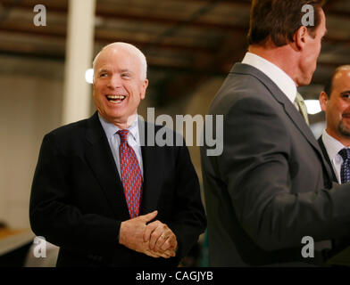 Jan 31, 2008 - Los Angeles, California, USA - Presidential hopeful JOHN MCCAIN smiles after California Governor ARNOLD SCHWARZENEGGER gave his endorsment, after touring Solar Integrated Technologies in Los Angeles before the Governor announce his endorsement of McCain at a news conference, Thursday  Stock Photo