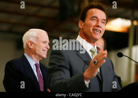 Jan 31, 2008 - Los Angeles, California, USA - Presidential hopeful JOHN MCCAIN smiles after California Governor ARNOLD SCHWARZENEGGER gave his endorsment, after a touring Solar Integrated Technologies in Los Angeles before the Governor announce his endorsement of McCain at a news conference. Also at Stock Photo