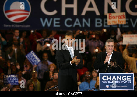 democratic presidential hopeful sen. barack obama, d-ill., left, waves as he campaigns with actor robert deniro, right, at rally in east rutherford, n.j., monday, feb. 4, 2008, in the final campaign push before super tuesday. Stock Photo