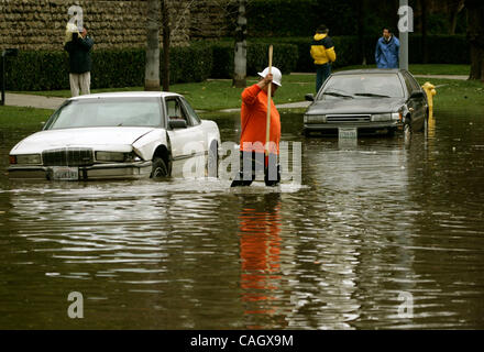 Jan 25, 2008 - Los Angeles, CA, USA - Heavy rains in Southern California led to street flooding on Rossmore Ave in the Hancock Park of Los Angeles when storm drains became clogged by debris. A very large storm is predicted to hit the area again on Saturday.  Photo by Jonathan Alcorn/ZUMA Press. © Co Stock Photo