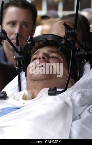 Firefighter Brian Smith, 43, of Ladder Company 44 is released from New York-Presbyterian Weill Cornell Medical Center on East 68th Street. Smith fell 30 feet from a ladder bucket while fighting a fire in the Bronx 22 days ago and suffers from a broken C1 vertebra, a cracked pelvis, punctured lungs a Stock Photo