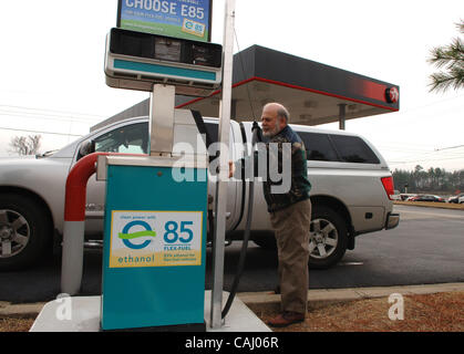 JERRY HOWELL of Marietta, GA pumps E-85 ethanol mix fuel into his 2005 nissan Titan truck from the Atlanta area's only alternative fuel pump, in Smyrna, Ga. 'It's a little cheaper, the truck runs fine, I get about 5 miles less for each gallon but I want to do my part,' in fighting emissions, he said Stock Photo