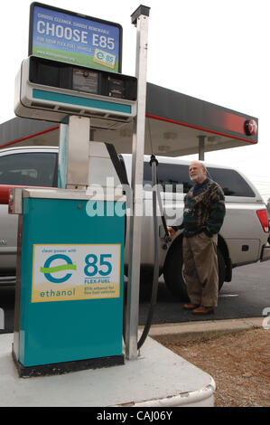 JERRY HOWELL of Marietta, GA pumps E-85 ethanol mix fuel into his 2005 nissan Titan truck from the Atlanta area's only alternative fuel pump, in Smyrna, Ga. 'It's a little cheaper, the truck runs fine, I get about 5 miles less for each gallon but I want to do my part,' in fighting emissions, he said Stock Photo