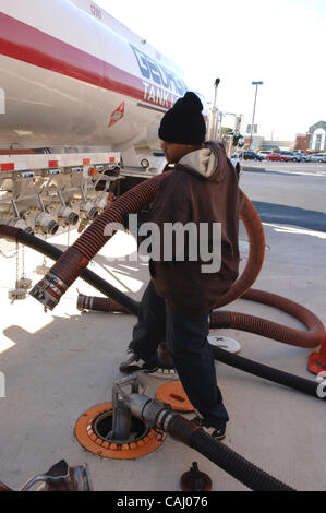 Jerry Howell of Marietta, GA pumps E-85 ethanol mix fuel into his 2005 nissan Titan truck from the Atlanta area's only alternative fuel pump, in Smyrna, Ga. 'It's a little cheaper, the truck runs fine, I get about 5 miles less for each gallon but I want to do my part,' in fighting emissions, he said Stock Photo