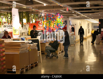 Subject: Ikea Man Lives in the Store Caption: Comedian and filmmaker MARK MALKOFF of Astoria, Queens, NY is living at the Ikea store in Paramus, New Jersey for one week while his apartment is fumigated. Here he continues his journey back to his 'apartment' relying on shopper-power to get  'home' fro Stock Photo