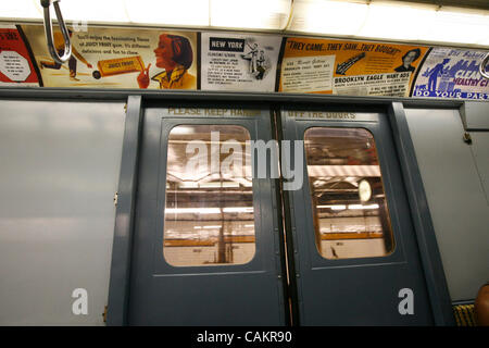 Sep 10, 2007 - Manhattan, NY, USA - Vintage advertisements decorate one of the cars of a pre-WWII subway train, made up of historic R1 cars, to commemorate the 75th anniversary of the A Train and IND (Independent Subway Services) subway opening in Manhattan, NY, on Monday, September 10, 2007. The si Stock Photo