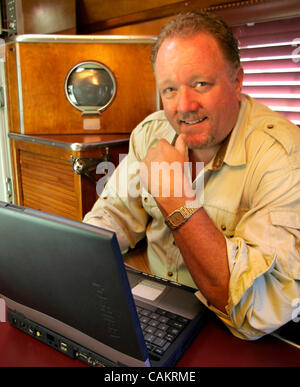 September 7, 2007 Rancho Santa Fe, CA. USA Glenn Smith posed in his 1947 trailer that he uses to write in up in the mountains. He has been working for a dozen years on a feature film, called 'THE HUNGRY WOMAN'  that opens Sept. 19th in about 20 theaters in the San Diego/Tijuana area.  Mandatory Cred Stock Photo