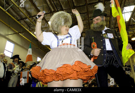 Nov. 01, 2003 - Carson City, Nevada, USA - ''Big Joy'' Mishiel, Mistress of Ceremonies at the World Beard and Moustache Championships in Carson City, Nevada, dances with Gerhard Schmidbauer of Kapfelberg, Germany during the opening ceremonies.  Contestants from 11 nations competed for world titles i Stock Photo