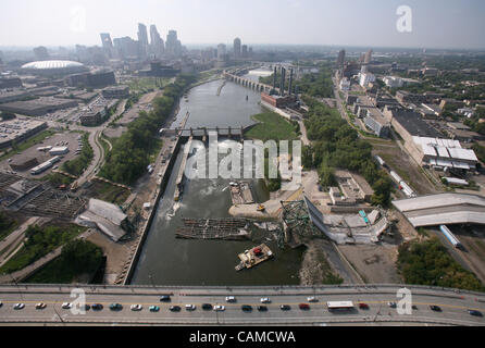 Sep 5, 2007 - Minneapolis, MN - As Congress bickered over a gas tax increase to help pay for bridge maintenance, crews continue to clear debris from the site of the I-35W bridge collapse, seen from the air Wednesday afternoon. PICTURED: The I-35W bridge, looking upriver towards downtown Minneapolis  Stock Photo