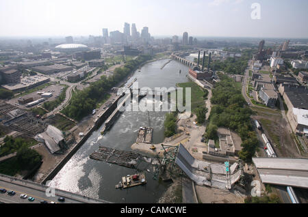 Sep 5, 2007 - Minneapolis, MN - As Congress bickered over a gas tax increase to help pay for bridge maintenance, crews continue to clear debris from the site of the I-35W bridge collapse, seen from the air Wednesday afternoon. PICTURED: The I-35W bridge, looking upriver towards downtown Minneapolis  Stock Photo