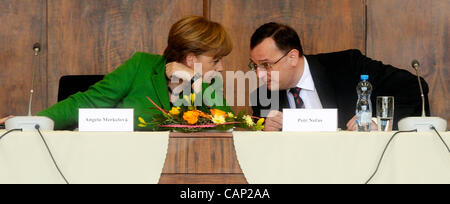 German Chancellor Angela Merkel (left) and Czech prime minister Petr Necas speak during the debate with students of Prague´s Faculty of Law on Tuesday, April 3, 2012. Merkel is in Czech Republic on a one-day official visit. (CTK Photo/Vit Simanek) Stock Photo