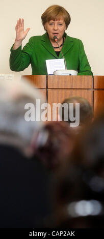 German Chancellor Angela Merkel speaks during the debate with students of Prague´s Faculty of Law on Tuesday, April 3, 2012. Merkel is in Czech Republic on a one-day official visit. (CTK Photo/Vit Simanek) Stock Photo