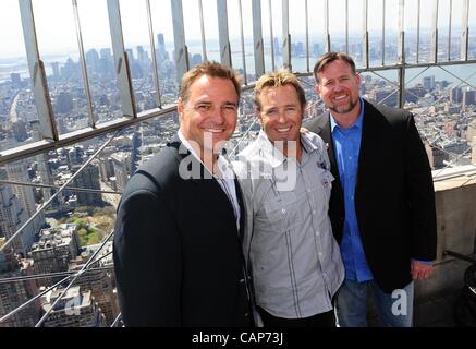 Sean Casey Kevin Millar Al Leiter Baseball legends light he Empire State  Building red white and blue to mark MLB opening day Stock Photo - Alamy
