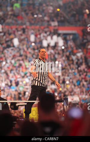 WWE legends The Undertaker wrestled Triple H at Wrestlemania 28 in Miami, FL at Sun Life Stadium. WWE Hall of Famer Shawn Michaels served as the special referee. The Undertaker won, advancing his streak to 20-0 at Wrestlemania events. Stock Photo