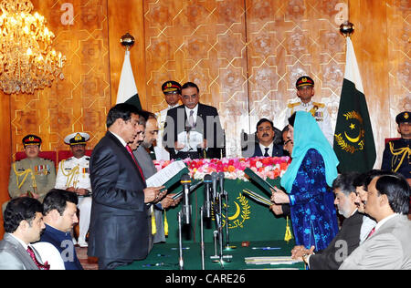 President, Asif Ali Zardari administers oath to the Federal Ministers during oath taking ceremony held at Aiwan- e- Sadr in Islamabad on Friday, April 13, 2012. Prime Minister, Syed Yousuf Raza Gilani also present on this occasion. Stock Photo