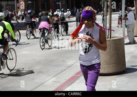 LOS ANGELES, CALIFORNIA, USA - APRIL 15, 2012 – Roads in Los Angeles are temporarily closed to motorized traffic for CicLAvia on April 15, 2012.  Pedestrians, cyclists and skateboarders make use of 10 miles of car-free routes throughout the City. Stock Photo